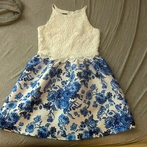 Royal blue floral dress with white lace top.